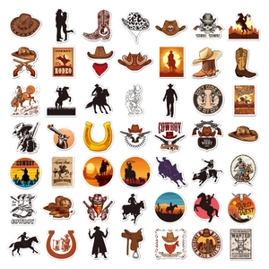 Flat lay of 100 Western cowboy stickers with hats, boots, and revolvers for skateboards