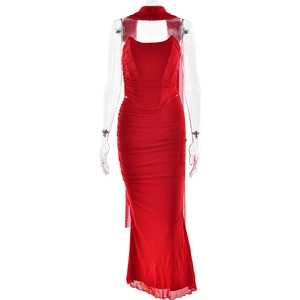 Detail view of red strapless ruched crop top and matching long skirt with scarf