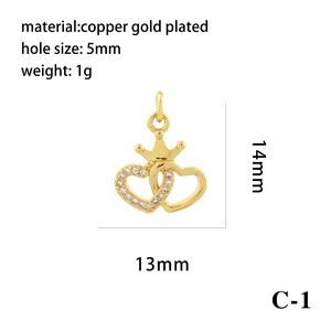 Macro shot of 18K gold plated interlocking heart pendant with crown details and dimensions