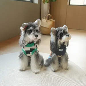 Cozy knit dog sweaters in green checkerboard and navy blue styles for small pets