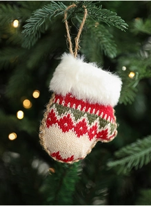 Detailed knitted mitten Christmas ornament featuring festive red and green Nordic patterns