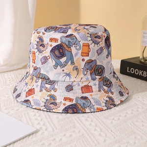 Reversible bucket hat with colorful elephant and suitcase prints for outdoor sun protection