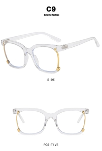 Detail view of square transparent glasses with gold metal trim from front and side angles