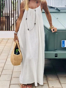 Elegant white backless maxi dress with pleats and thin straps for summer beach vacations