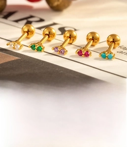 Detail of 1.2mm x 6mm stainless steel screw back cartilage studs with colorful zircons