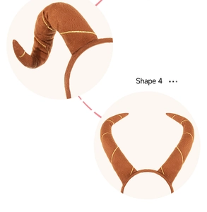 Detailed macro view of plush brown devil horns with golden spiral wire accents