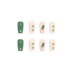 Pink and dark green ballet style press-on nails with heart patterns and cross designs