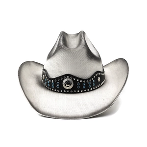 Detail of silver cowboy hat featuring black band with star badges and turquoise accents
