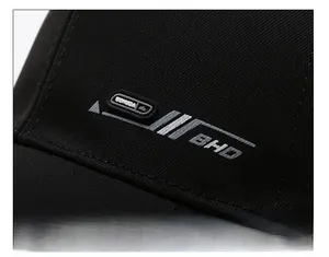 Detailed view of black cotton baseball cap showing BHD lettering and fine stitching