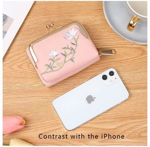 Pink lychee texture mini bag with lotus embroidery shown beside an iPhone for size scale