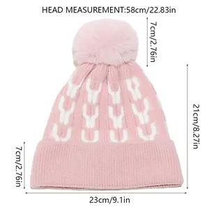 Size chart showing head circumference and dimensions for the pink knit beanie with pompom