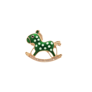 Elegant green enamel rocking horse brooch with gold trim and white rhinestones