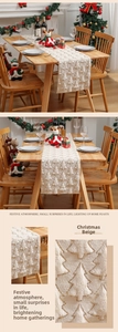 Detail of Christmas beige table runner with flocked trees and gold sequins on a dining table