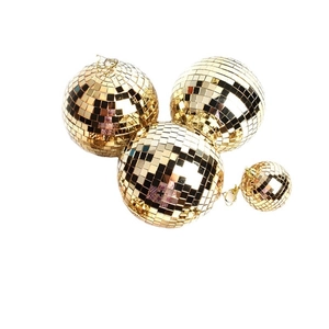 Golden disco ball ornaments for Christmas tree decor in various sizes with mirror finish