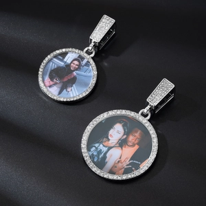 Macro shot of custom round photo pendant with shimmering cubic zirconia pavé setting