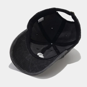 Deep grey washed cotton baseball cap with ghost embroidery and 100% cotton inner lining