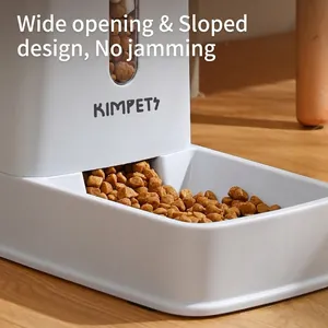 Automated pet feeder for cats and dogs with a large clog-free bowl and transparent window