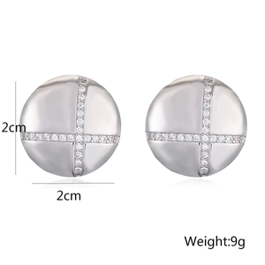 Detail view of round 18K gold plated earrings with zircon studs, size 2cm and weight 9g