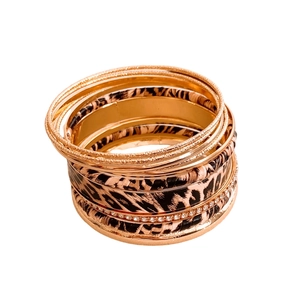 Stacked leopard print bangle set with gold textured rings and sparkling rhinestones
