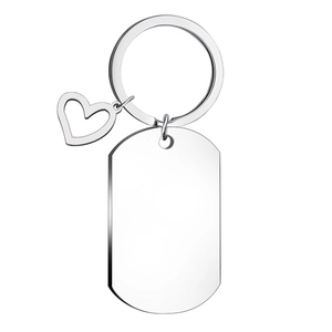 Close-up of polished stainless steel keychain with heart charm and rectangular army tag