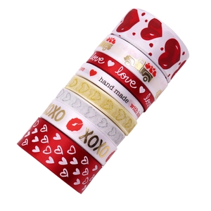 Polyester satin ribbons with gold heart and XOXO prints for Valentine's Day gift wrapping