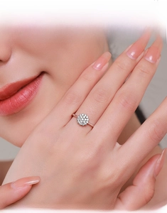 Macro shot of S925 sterling silver ring with micro-pave diamonds on a model finger