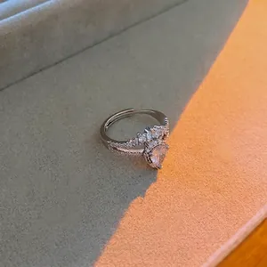 Elegant adjustable zircon heart ring in silver finish with sparkling drop-shaped stone