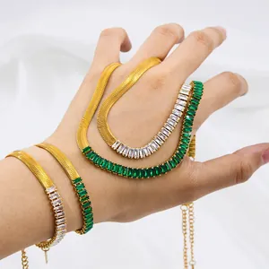 Golden snake chain necklace and bracelet set with green and white rectangular zircons