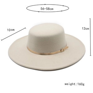 Detailed view of beige flat-top wool felt hat with 10cm wide brim and golden buckle