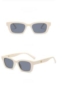 Front and side views of vintage cream rectangle sunglasses with dark gray lenses