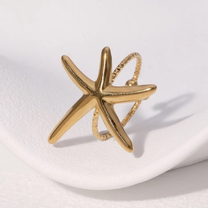 Minimalist 18k gold starfish ring for women with textured band on a wave surface