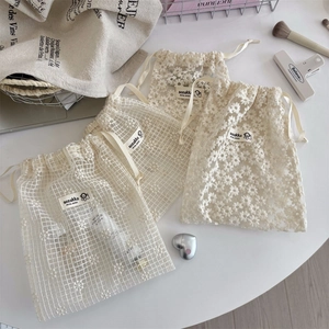 Daisy embroidered lace drawstring organizer bags in cream white for travel and cosmetics