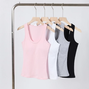Collection of four ribbed cotton athletic tank tops in pink, white, gray, and black