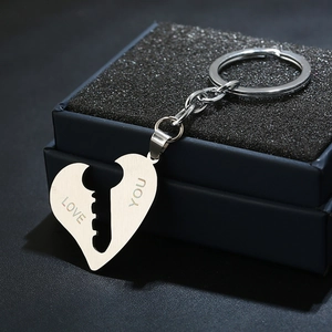 Polished stainless steel heart-shaped couple keychain set with I Love You engraving