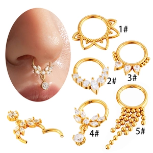 Golden stainless steel septum rings set with CZ stones and tassel fringe designs