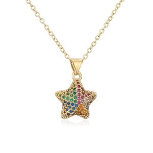 Macro shot of 18K gold star pendant with multi-colored zircons on white background