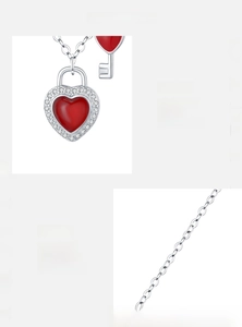 Detail of 925 sterling silver heart lock necklace with red stone and hand-set zircons