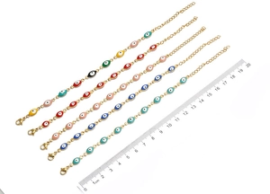 Length measurement of colorful Evil Eye stainless steel bracelets showing the 20cm size