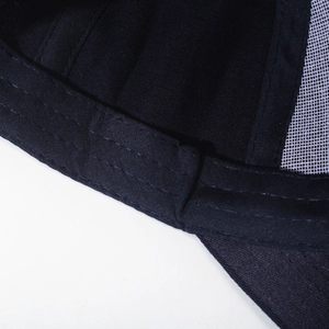 Detailed close-up of double-stitched reinforced inner band on a black baseball cap