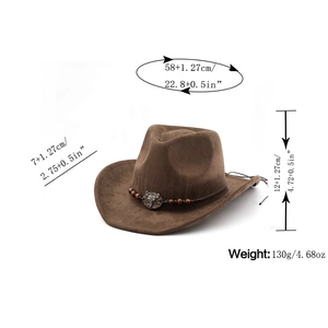 Detail of Western cowboy hat with faux suede texture, braided rope, and bull skull ornament