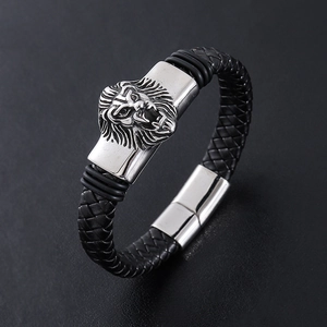 Men's braided leather bracelet featuring a silver lion head and magnetic clasp