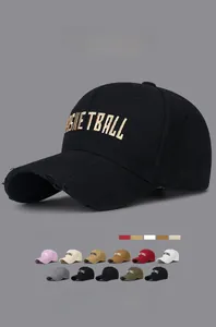 Detailed close-up of Basketball embroidery and vintage distressed rips on baseball cap
