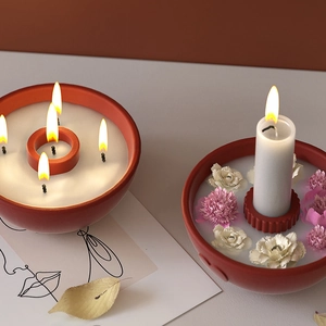 Artistic red resin candle mold set with multi-wick wax and floating daisy flowers