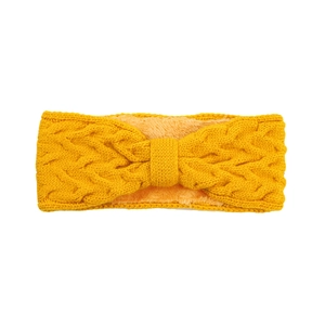 Detailed view of yellow knitted winter headband with warm fleece lining and bow design