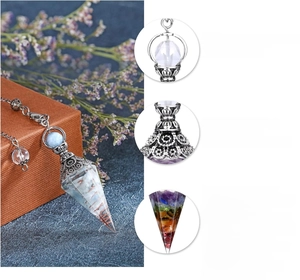 Detail view of healing resin pendulum with antique silver pattern and natural gemstones