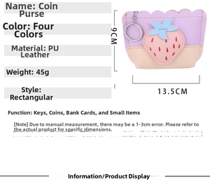 Detail of strawberry coin purse made of purple PU leather with metal keychain