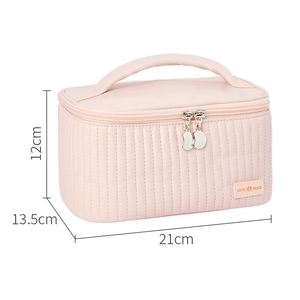 Pink PU leather makeup bag with dimensions 21x13.5x12cm featuring top handle and vertical stitching