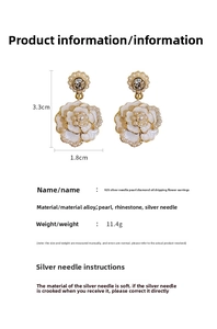 Detail view of vintage floral earrings with pearls and rhinestones size 3.3x1.8cm