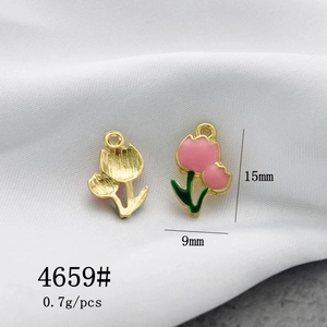 Detailed pink enamel tulip flower pendant 15mm x 9mm with golden metal back and loop