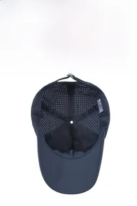Macro view of quick-dry baseball cap interior with laser-cut ventilation holes